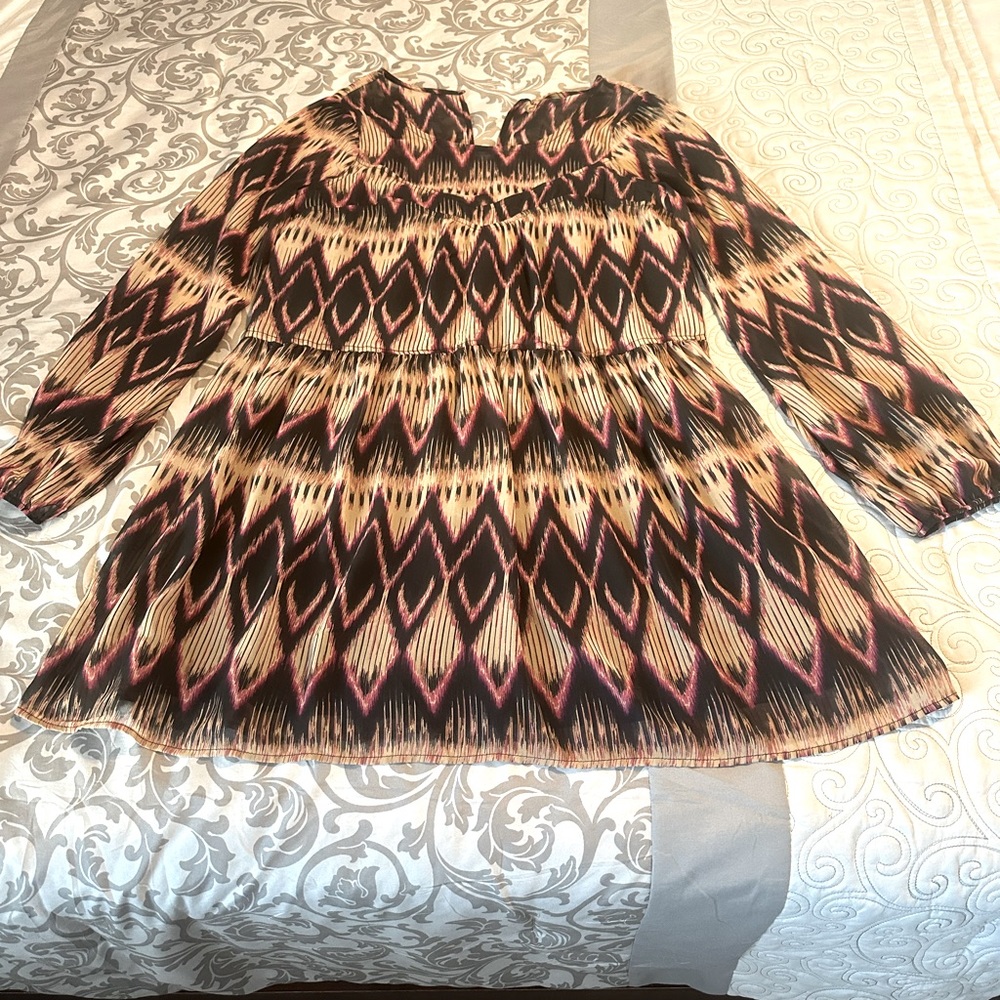 Women’s dress. Multi colored. Great with boots. Worn a few times.